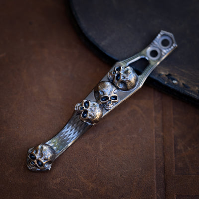 Steel Flame x Ti2 -- 2 Hole Mini Pile of Skulls